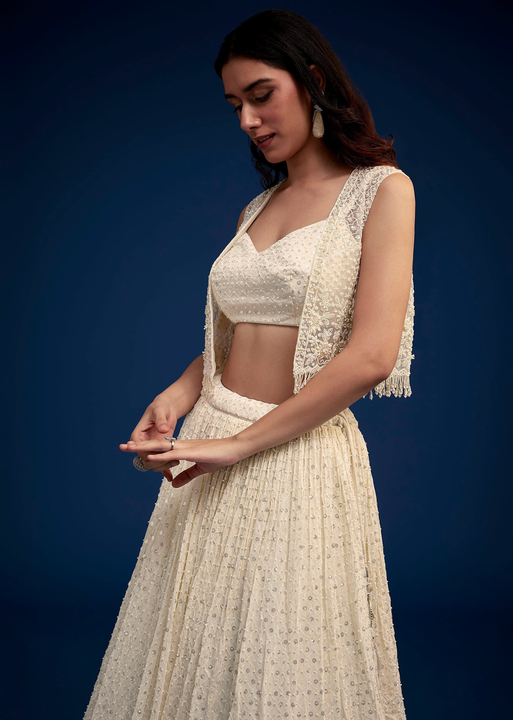 ivory_embroidered_lehenga_set_with_jacket-sg278557_4_0b385985-e00d-409f-8eb2-fd2043cb107d.jpg