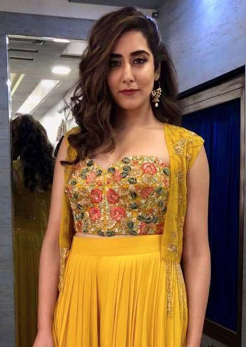 jonita-gandhi-in-kalki-dustan-sun-mustard-palazzo-in-georgette-with-strapless-corset-and-embroidered-net-jacket-with-tassels-485800_3_83ee36a7-e7c2-46a9-98c2-db29fb2aff89.jpg