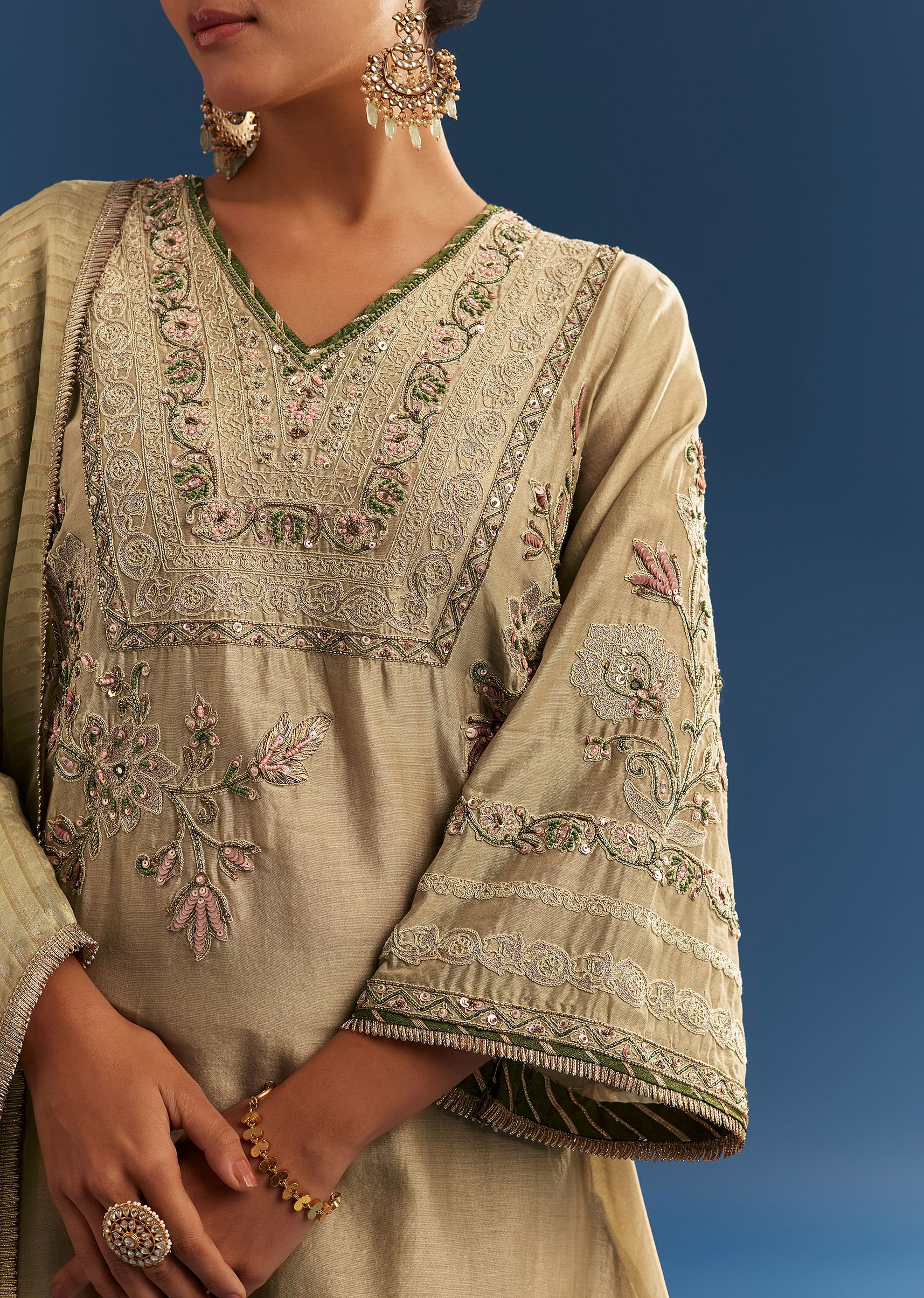 light-green-chanderi-kurta-set-with-organza-dupatta-and-tassel-tie-up-back-sg305280-1_2d4956c8-6e45-473f-850e-3297042d15a6.jpg