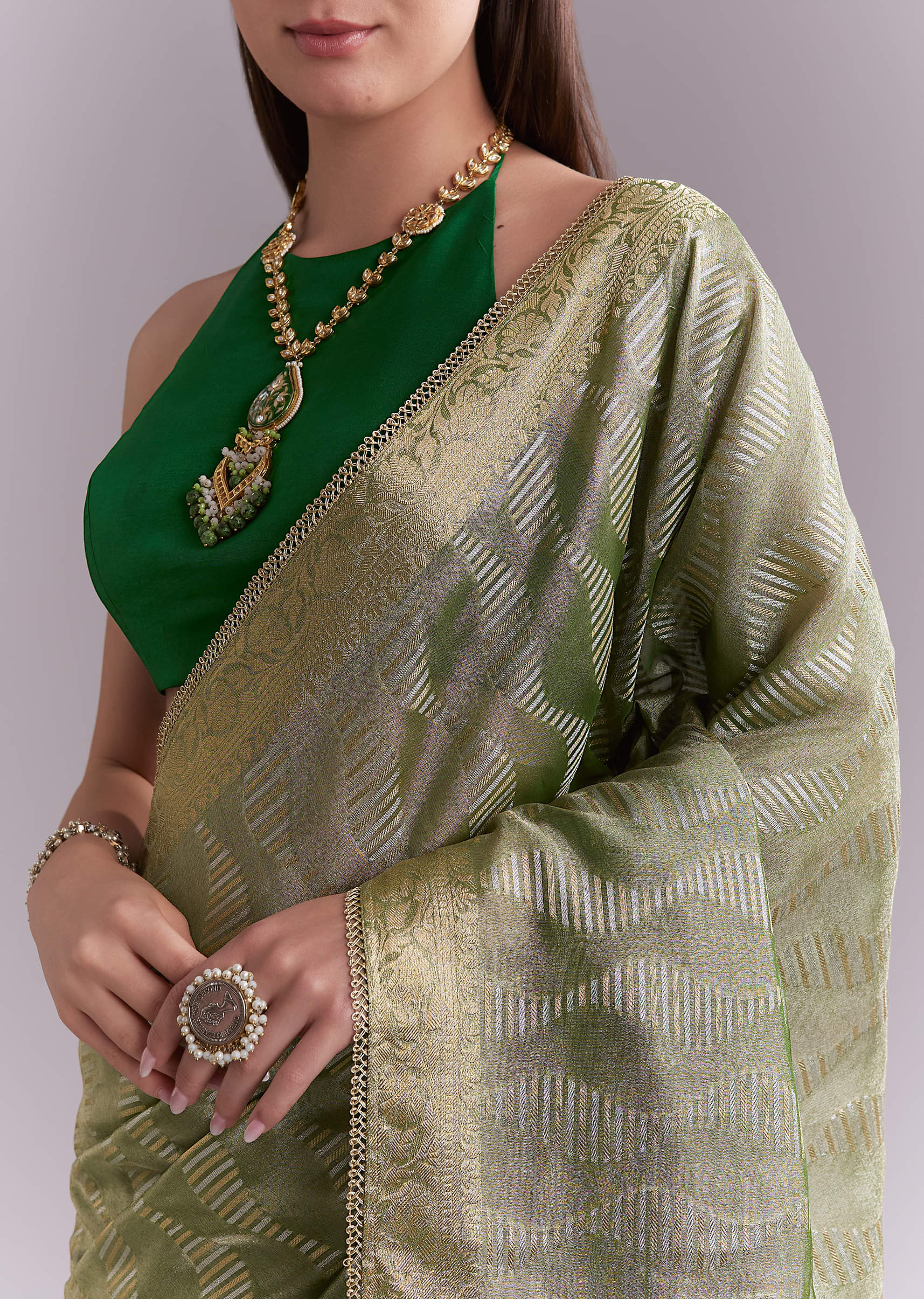 light-green-tissue-saree-with-subtle-weave-and-zari-border-sg351928-3.jpg