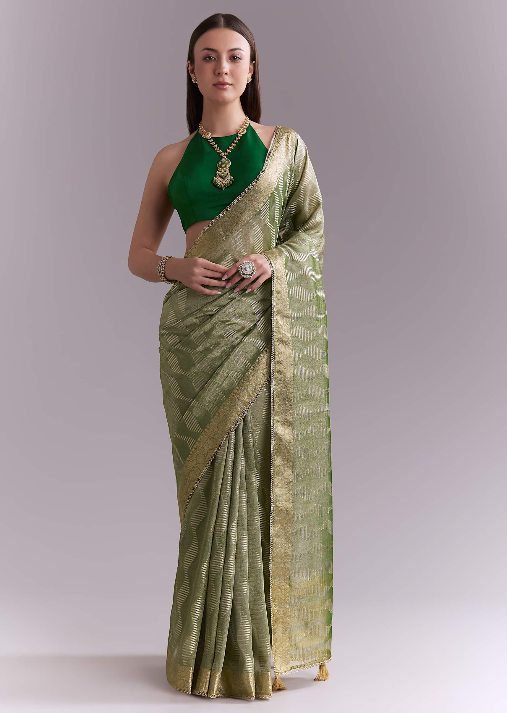 light-green-tissue-saree-with-subtle-weave-and-zari-border-sg351928-5.jpg