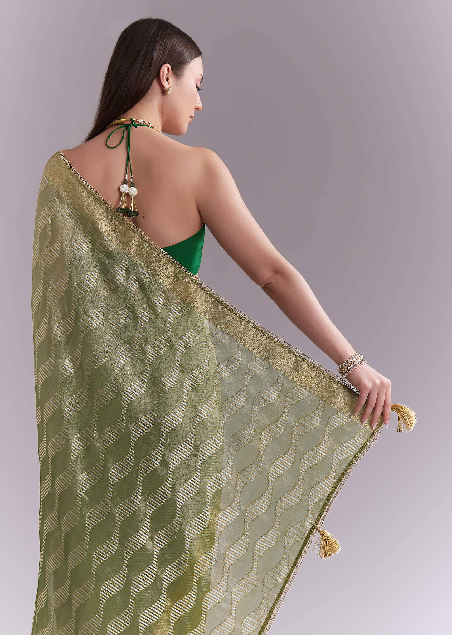 light-green-tissue-saree-with-subtle-weave-and-zari-border-sg351928-6.jpg