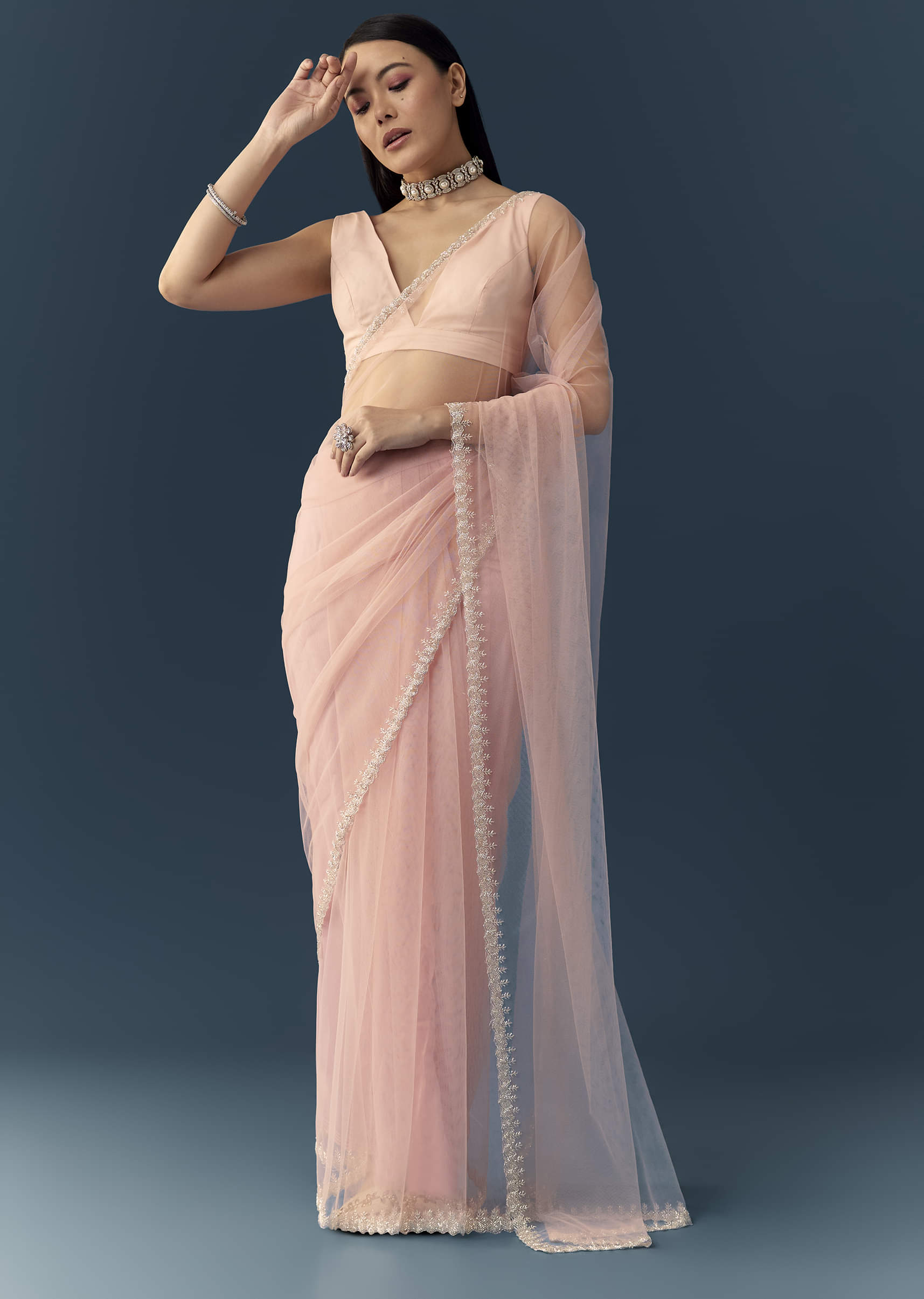 light-pink-net-saree-with-zigzag-cutwork-and-unstitched-blouse-sg339623-1.jpg