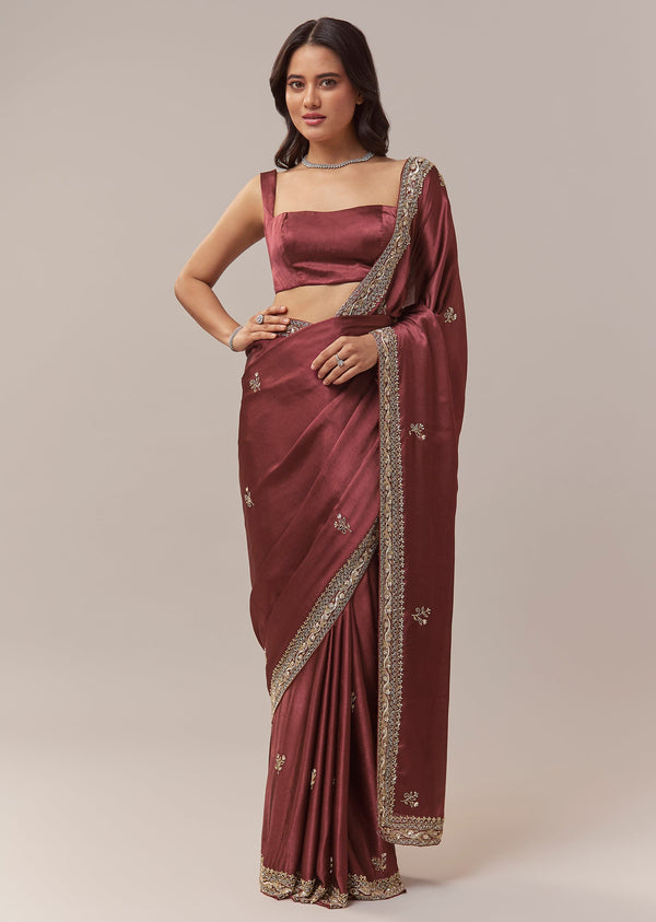 Maroon Chinnon Saree With All Over Butti And Heavy Embroidered Border