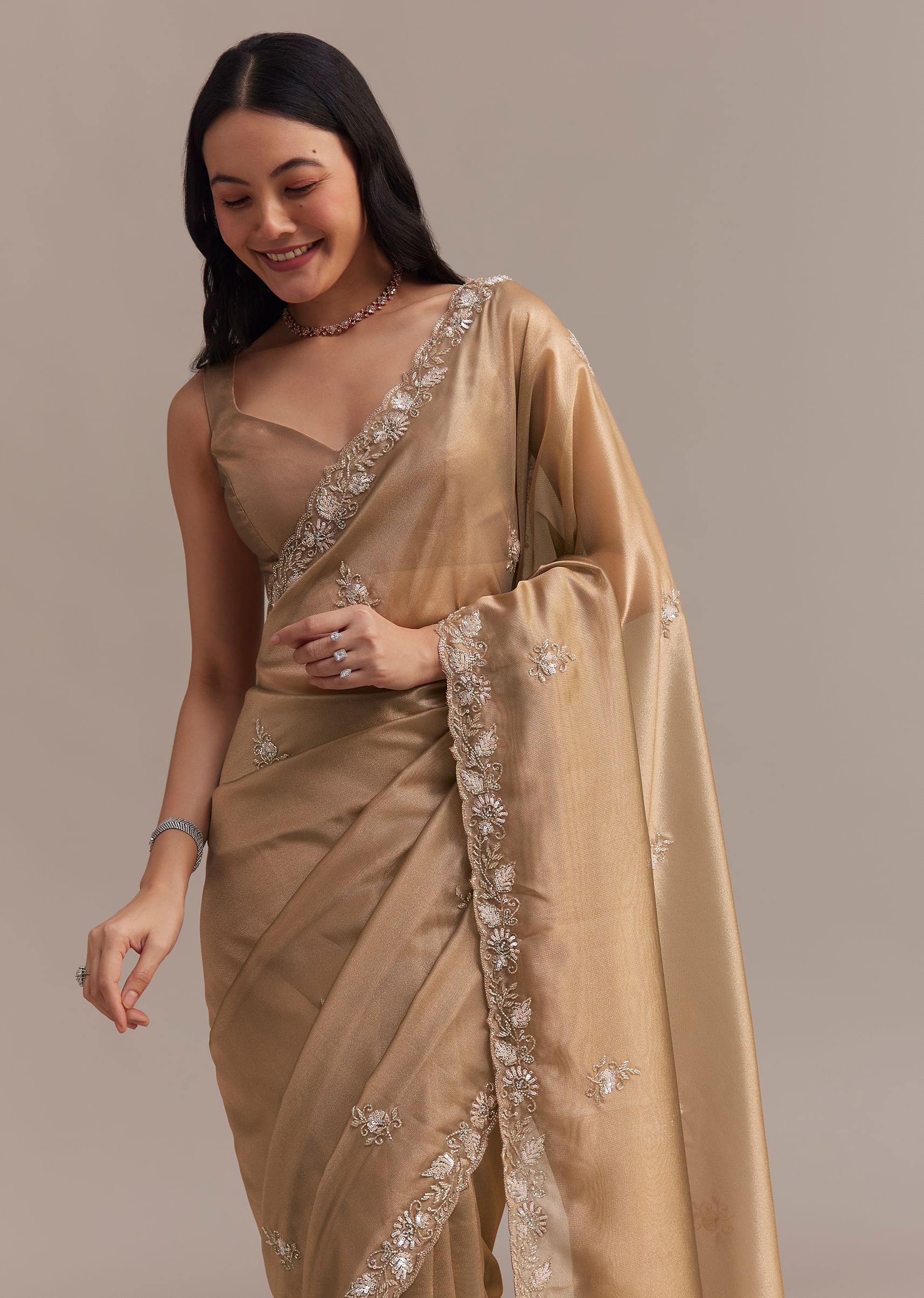 metallic_gold_organza_tissue_saree_with_cutdana_and_bead_embroidery-sg286754_6_f001e227-1efa-4e00-9a08-8872786f5cd3.jpg