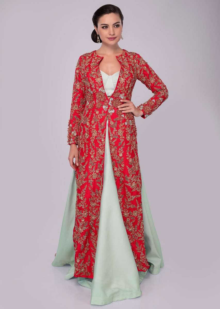 Mint green skirt and strap less corset blouse paired with fuchsia pink jacket with trial