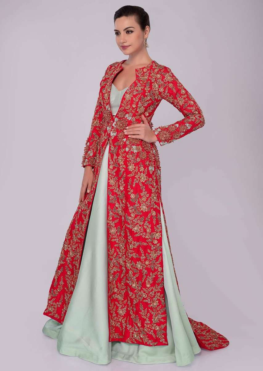 Mint green skirt and strap less corset blouse paired with fuchsia pink jacket with trial