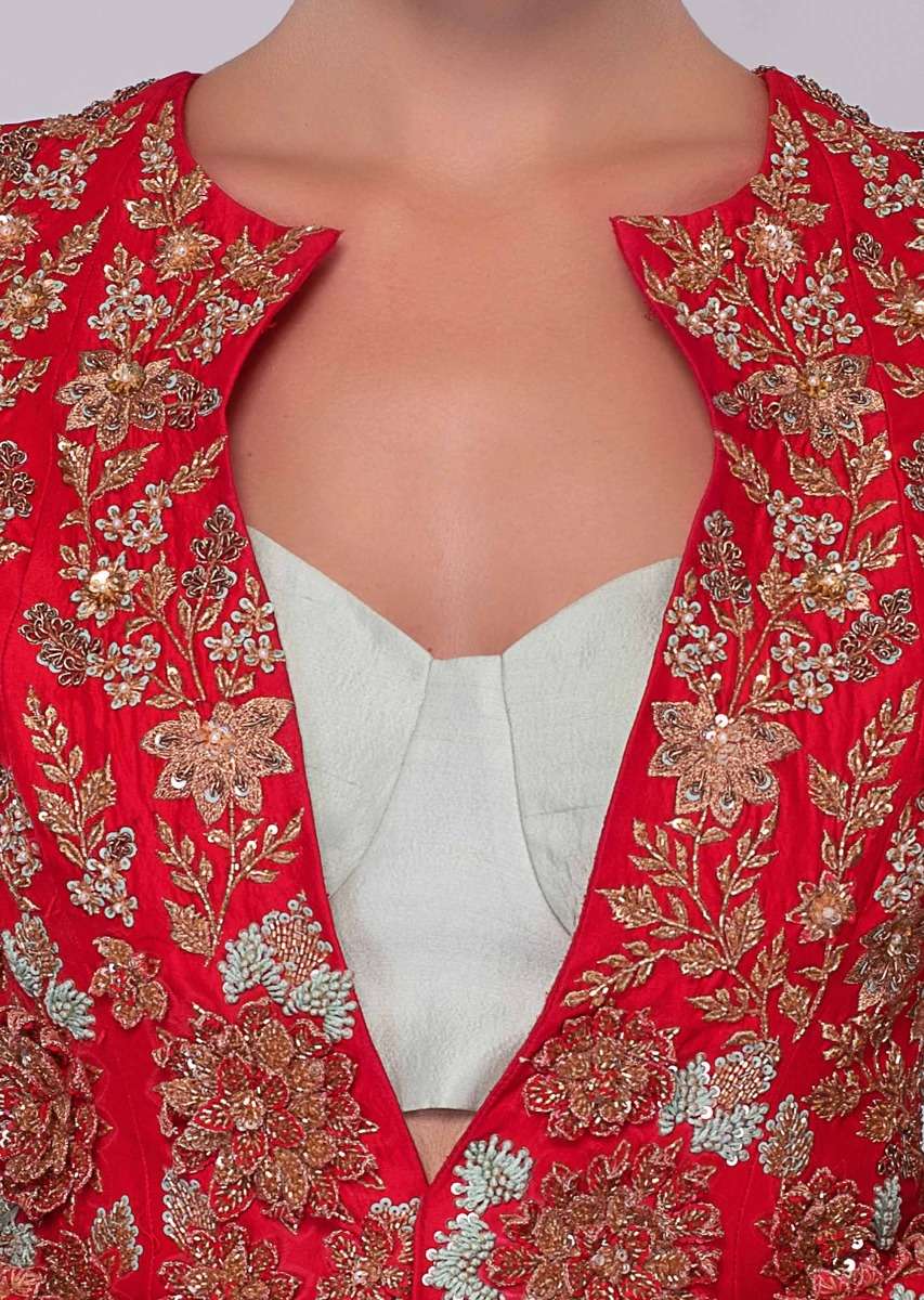 Mint green skirt and strap less corset blouse paired with fuchsia pink jacket with trial