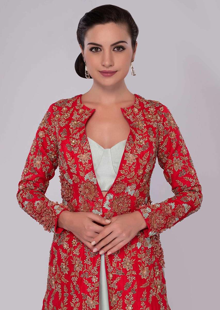 Mint green skirt and strap less corset blouse paired with fuchsia pink jacket with trial