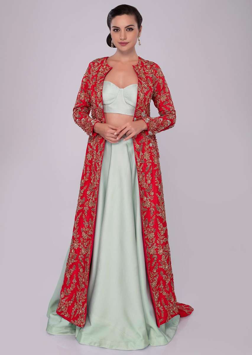 Mint green skirt and strap less corset blouse paired with fuchsia pink jacket with trial