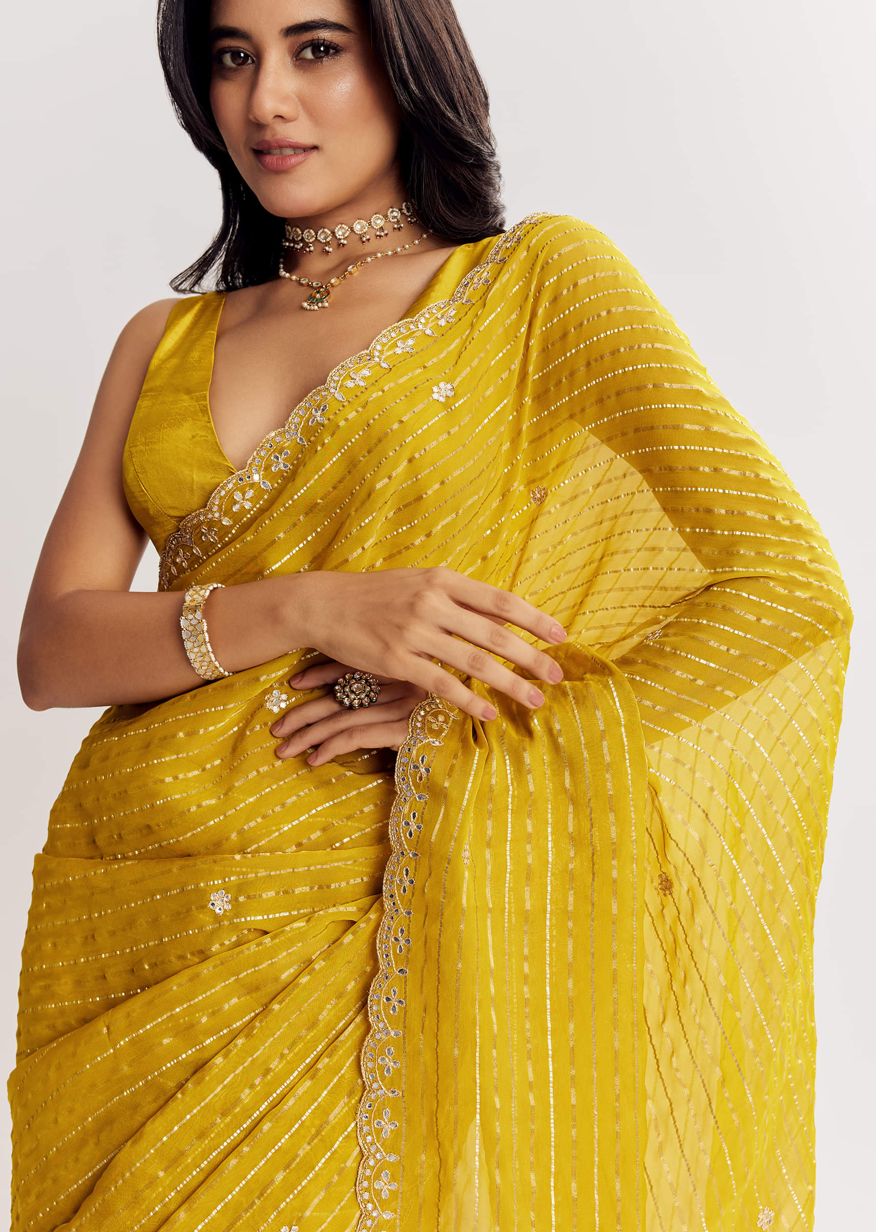mustard-yellow-georgette-saree-with-foil-stripes-and-mirror-gota-patti-work-sg317392-3_dc730c0a-fca6-4c4f-b5fe-e274a08e851a.jpg