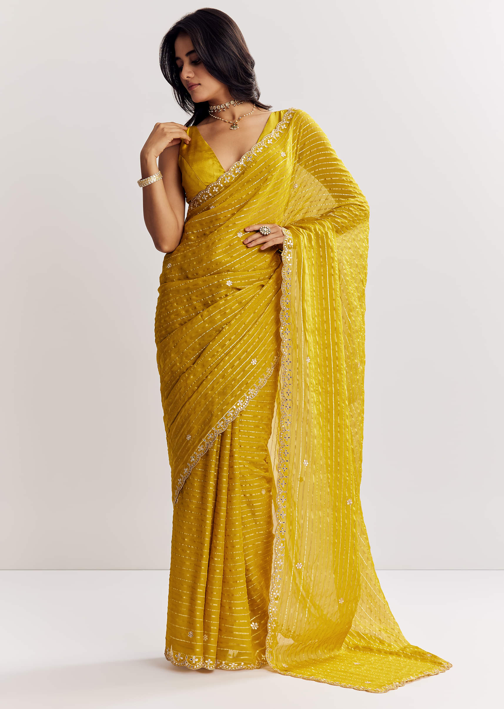 mustard-yellow-georgette-saree-with-foil-stripes-and-mirror-gota-patti-work-sg317392-5_e9d5b64a-09a9-48cd-8e4f-c5e2781e052f.jpg