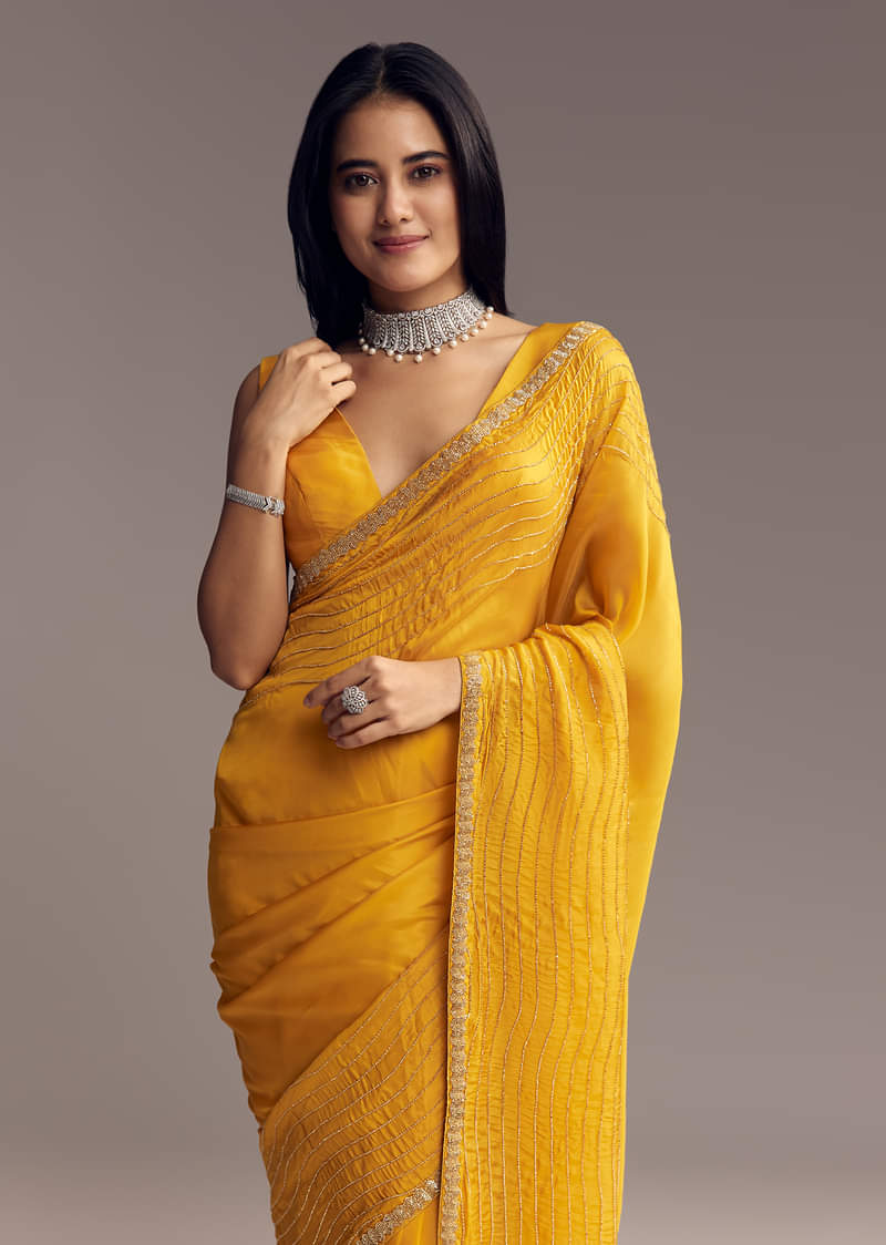 mustard-yellow-organza-saree-with-scallop-border-and-stone-work-sg317715-1_811c2b46-f61f-449d-80f1-72babc09d82f.jpg