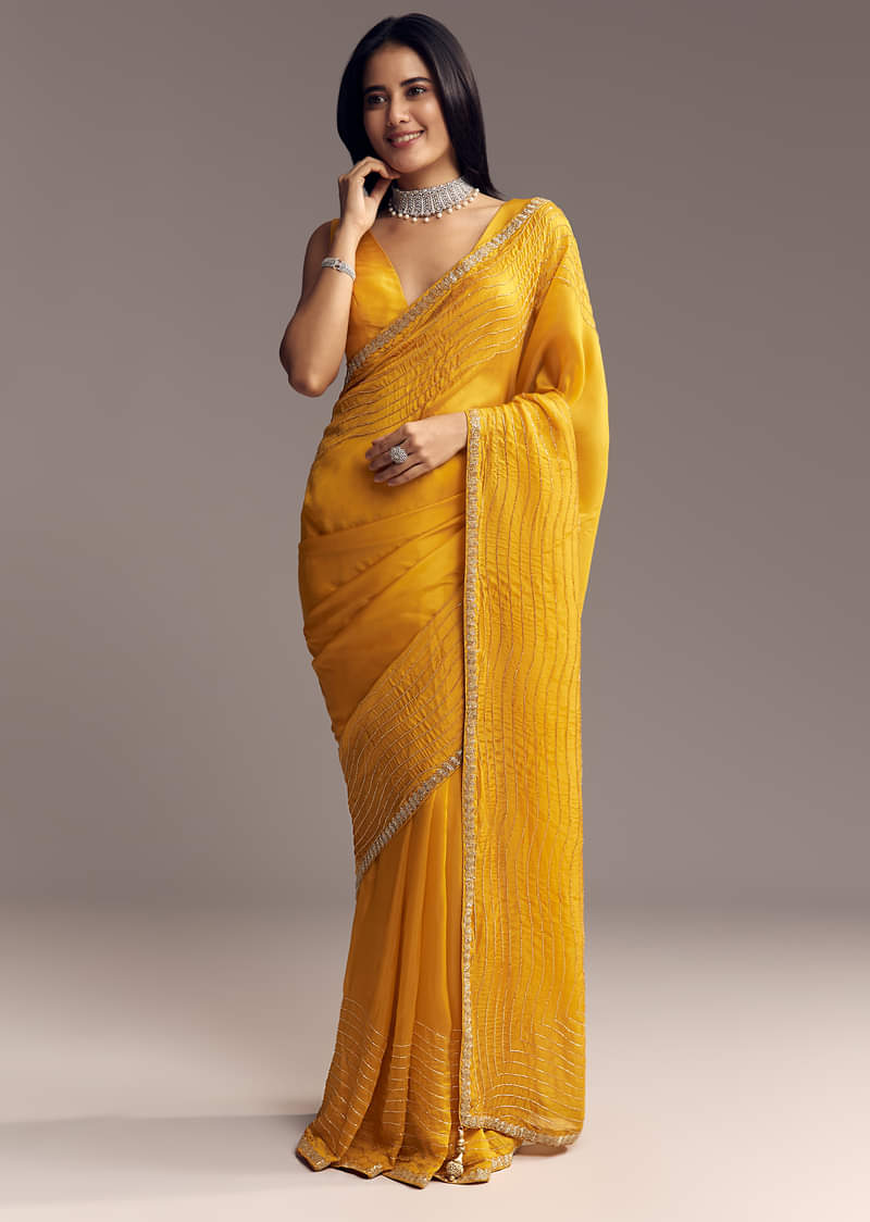 mustard-yellow-organza-saree-with-scallop-border-and-stone-work-sg317715-2_03a7f4b0-5f48-43cb-8341-3c68732e80a8.jpg