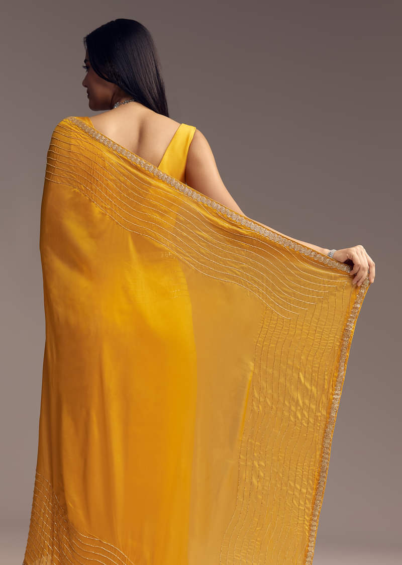 mustard-yellow-organza-saree-with-scallop-border-and-stone-work-sg317715-4_de9f007e-124a-40de-8bd7-a2371bc9b24d.jpg