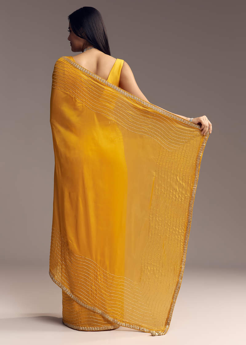 mustard-yellow-organza-saree-with-scallop-border-and-stone-work-sg317715-6_1a58dfe3-aa3e-4692-9f52-c6060fc5d8d7.jpg