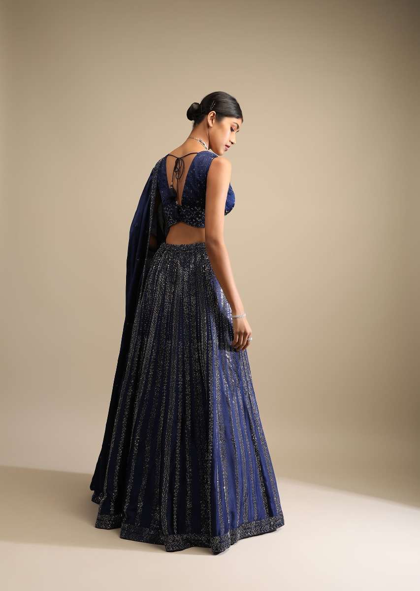 navy-blue-lehenga-in-satin-blend-embellished-with-kundan-work-in-striped-design-online-kalki-fashion-k008552y-sg72894_6_2d7d253d-63e2-4473-982b-2621aab43ee1.jpg
