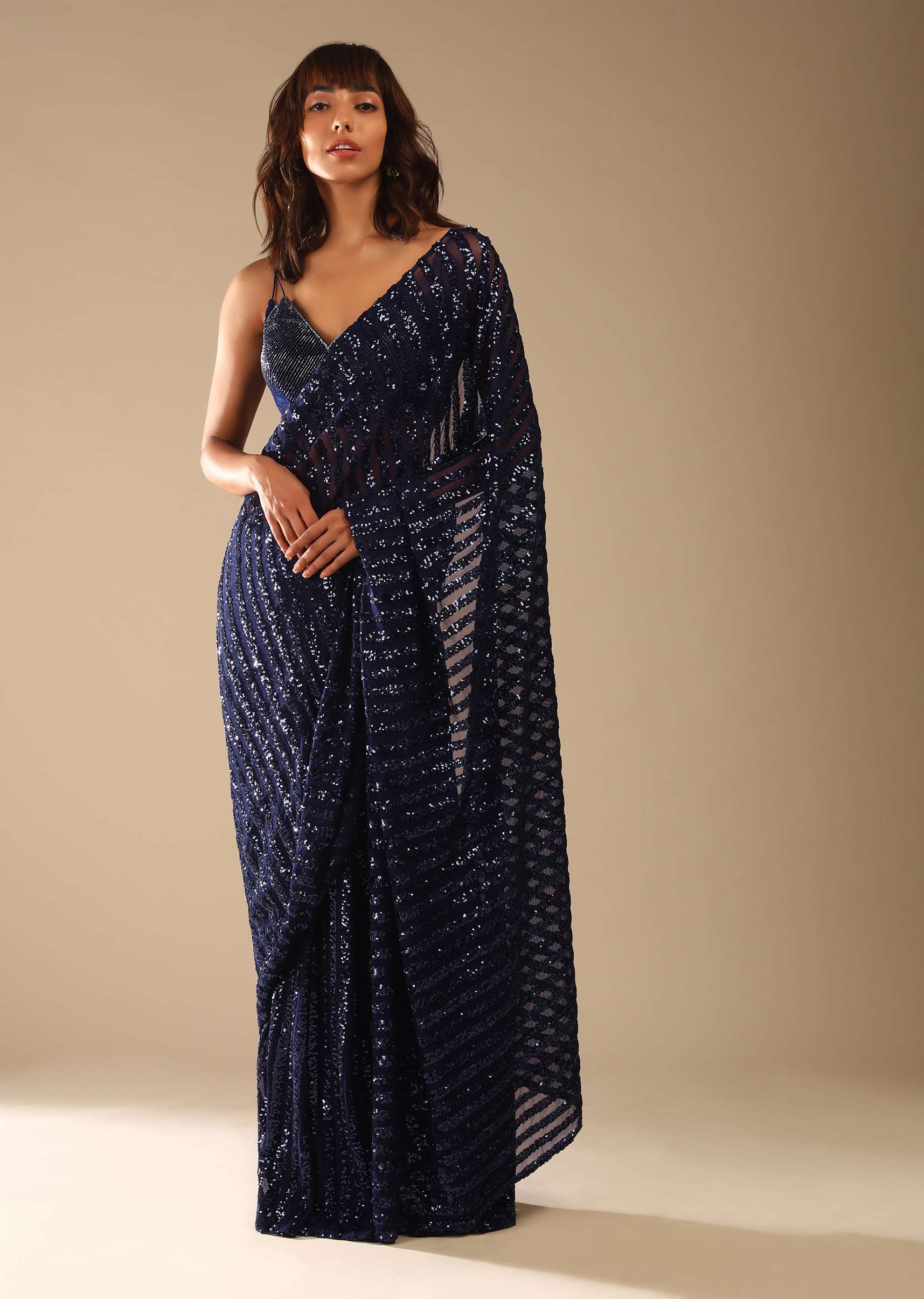 navy-blue-saree-in-striped-sequins-fabric-and-a-cut-dana-embellished-velvet-blouse-with-double-spaghetti-straps-online-kalki-fashion-m001tr341y-sg61166_3_5ac67fc4-570f-4c04-85a8-52fbeb541d4c.jpg