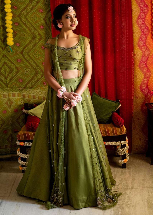 niti-taylor-in-kalki-parrot-green-lehenga-and-crop-top-in-raw-silk-with-a-matching-heavy-embroidered-long-jacket-479937_1__1_1_7441f61a-3923-4549-9ec3-407145d88c9f.jpg