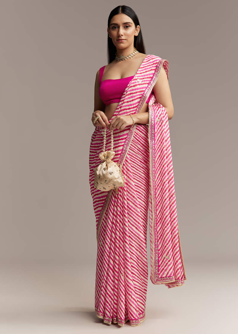 off-white-chinnon-saree-with-pink-striped-print-and-gota-detailing-sg318059-1.jpg