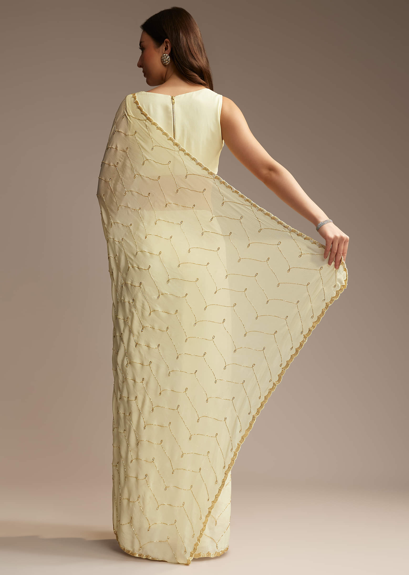 off-white-chinon-saree-with-cutdana-and-stone-work-sg317719-6.jpg