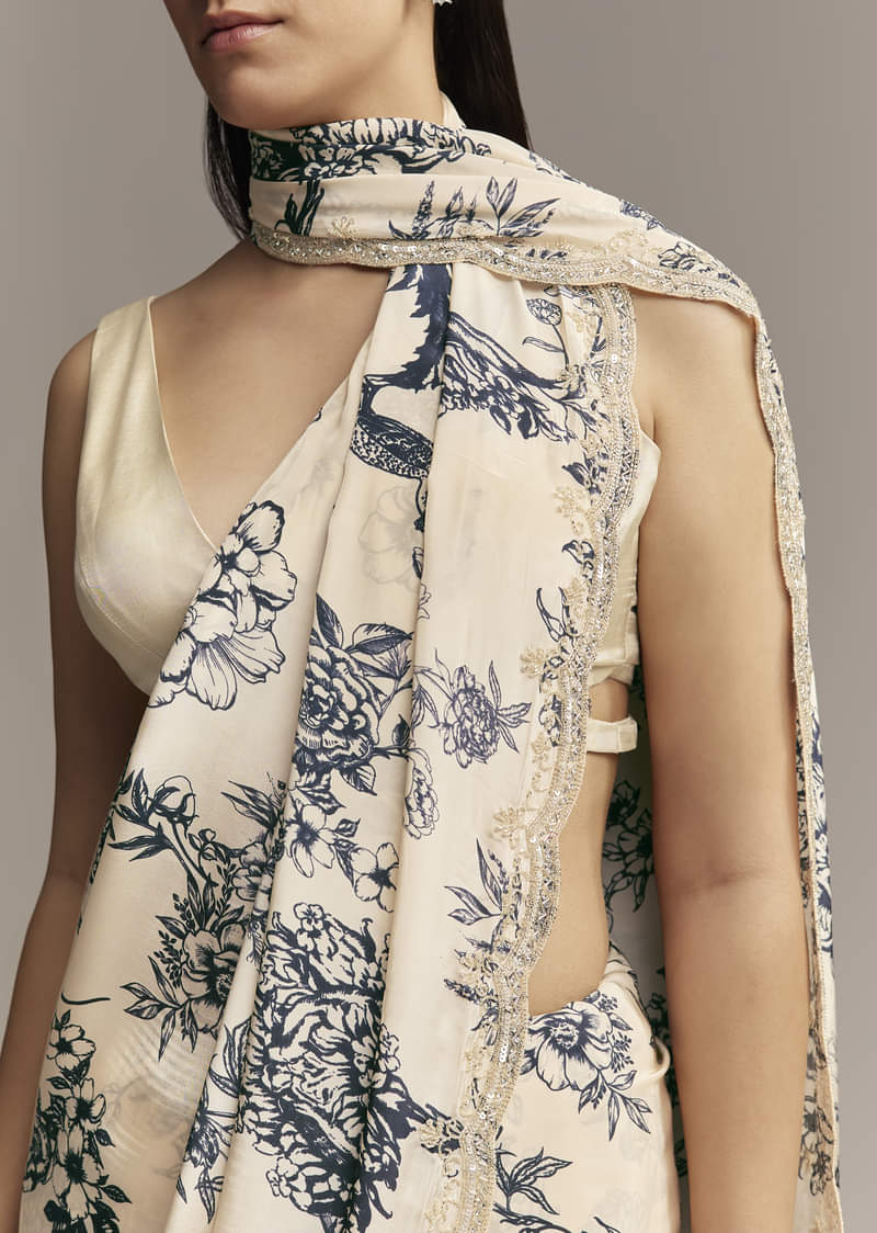 off-white-crepe-saree-with-black-floral-print-and-embroidered-border-sg328006-2.jpg