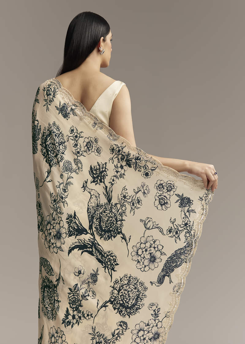 off-white-crepe-saree-with-black-floral-print-and-embroidered-border-sg328006-6.jpg