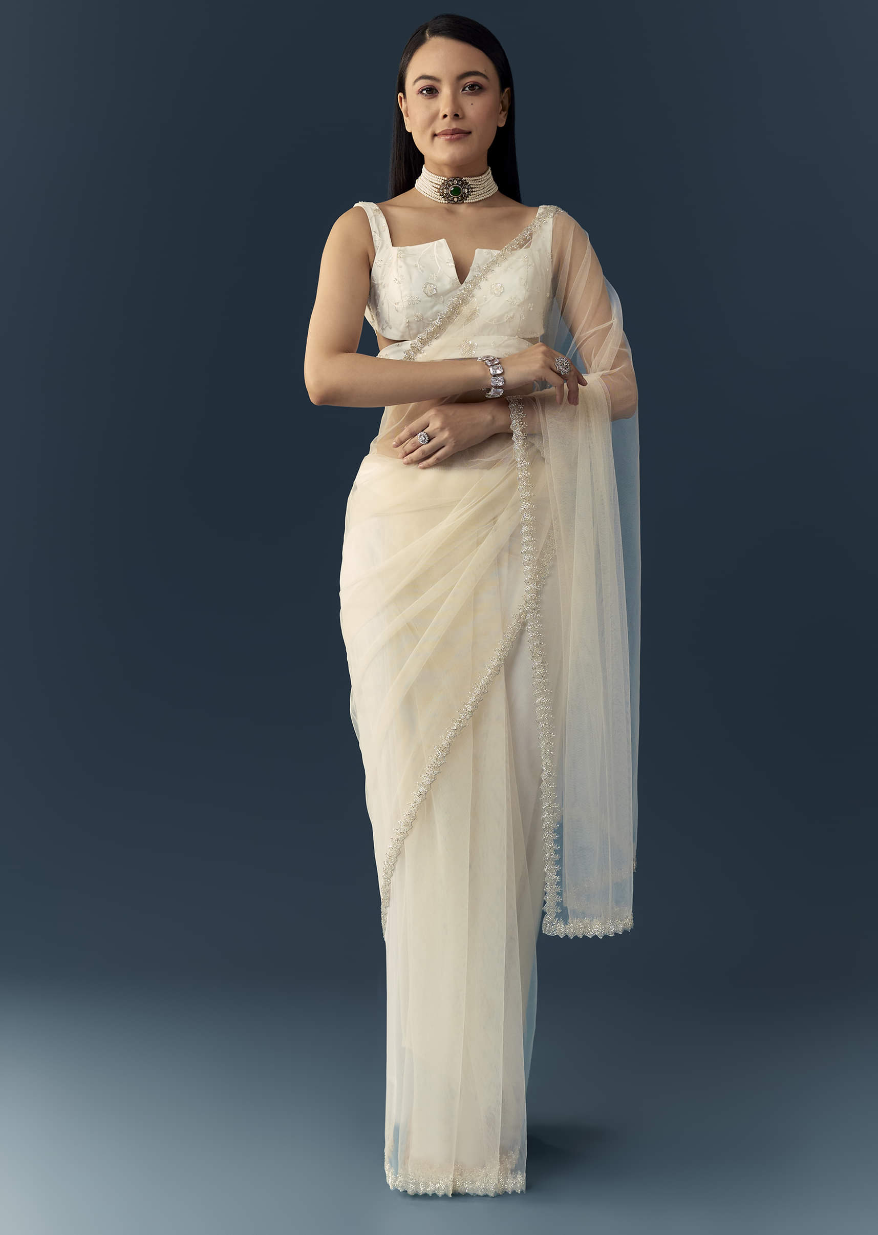 off-white-net-cutwork-border-saree-with-unstitched-blouse-sg339621-1.jpg