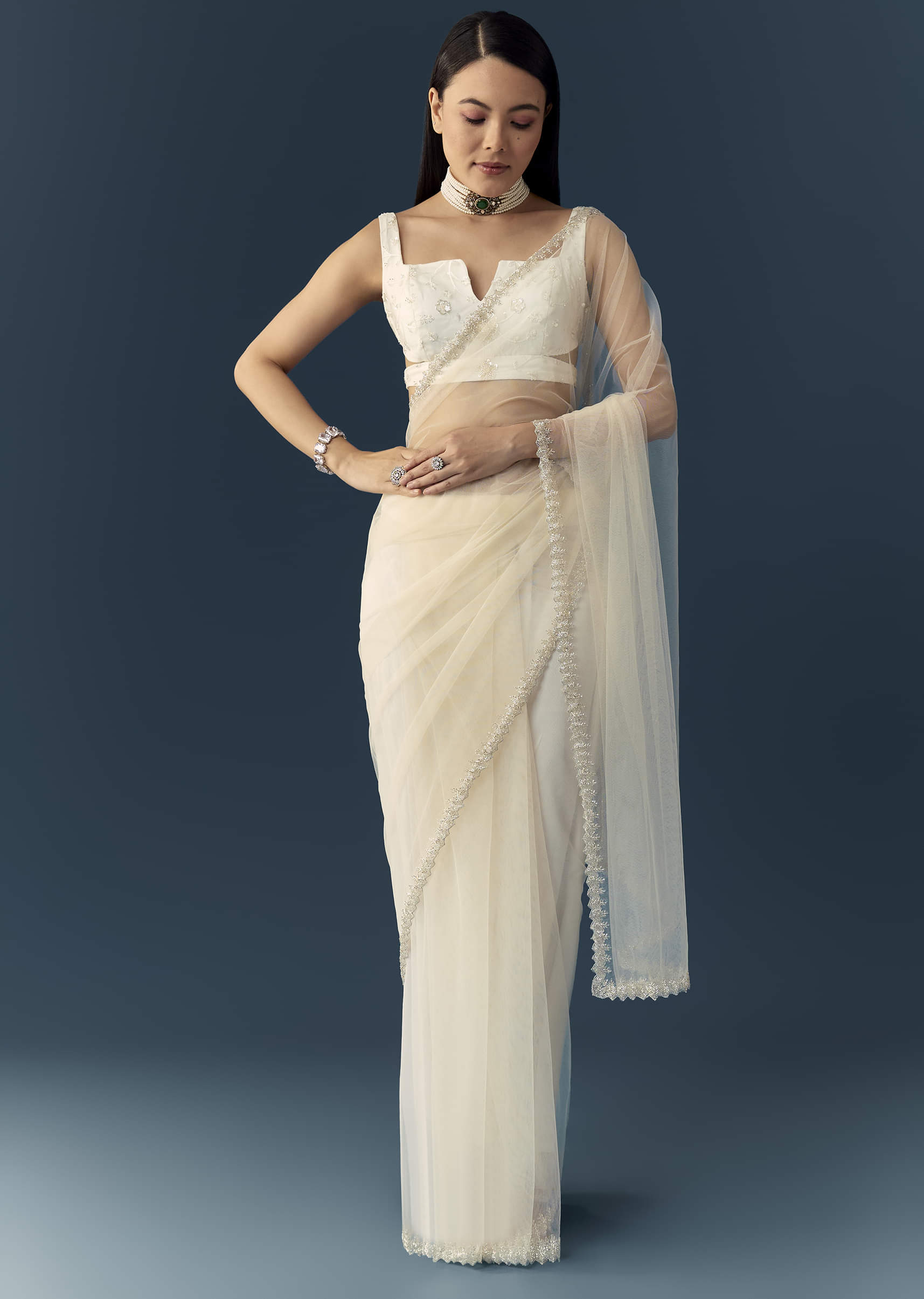 off-white-net-cutwork-border-saree-with-unstitched-blouse-sg339621-3.jpg