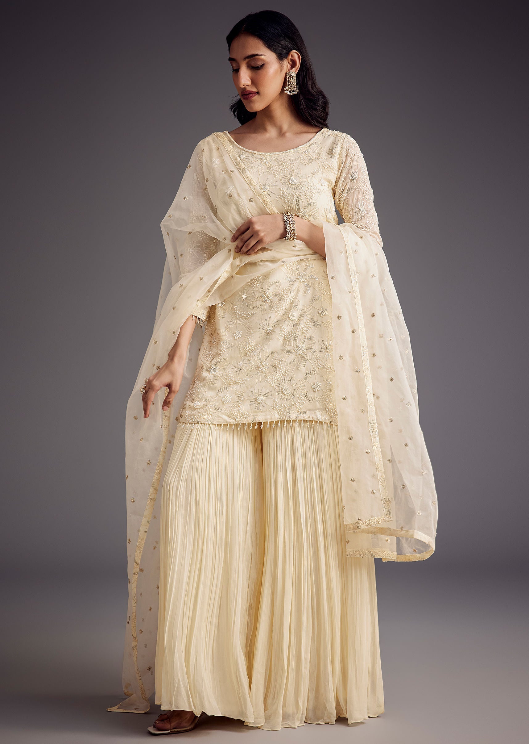 off_white_embroidered_sharara_set_with_organza_dupatta-sg285776_12_1f729033-b920-4d3e-8d72-f72fce709356.jpg