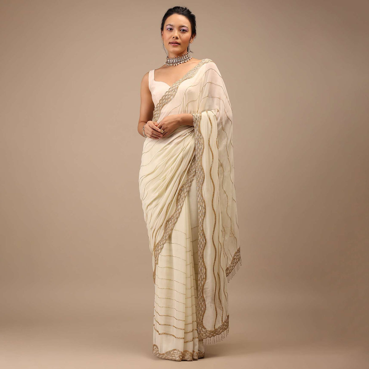 off_white_georgette_saree_with_cut_dana_zardosi-k006mr76y-sg99676_2_ef7c0eb3-9aaf-4871-acf9-6cc4d6a660ac.jpg
