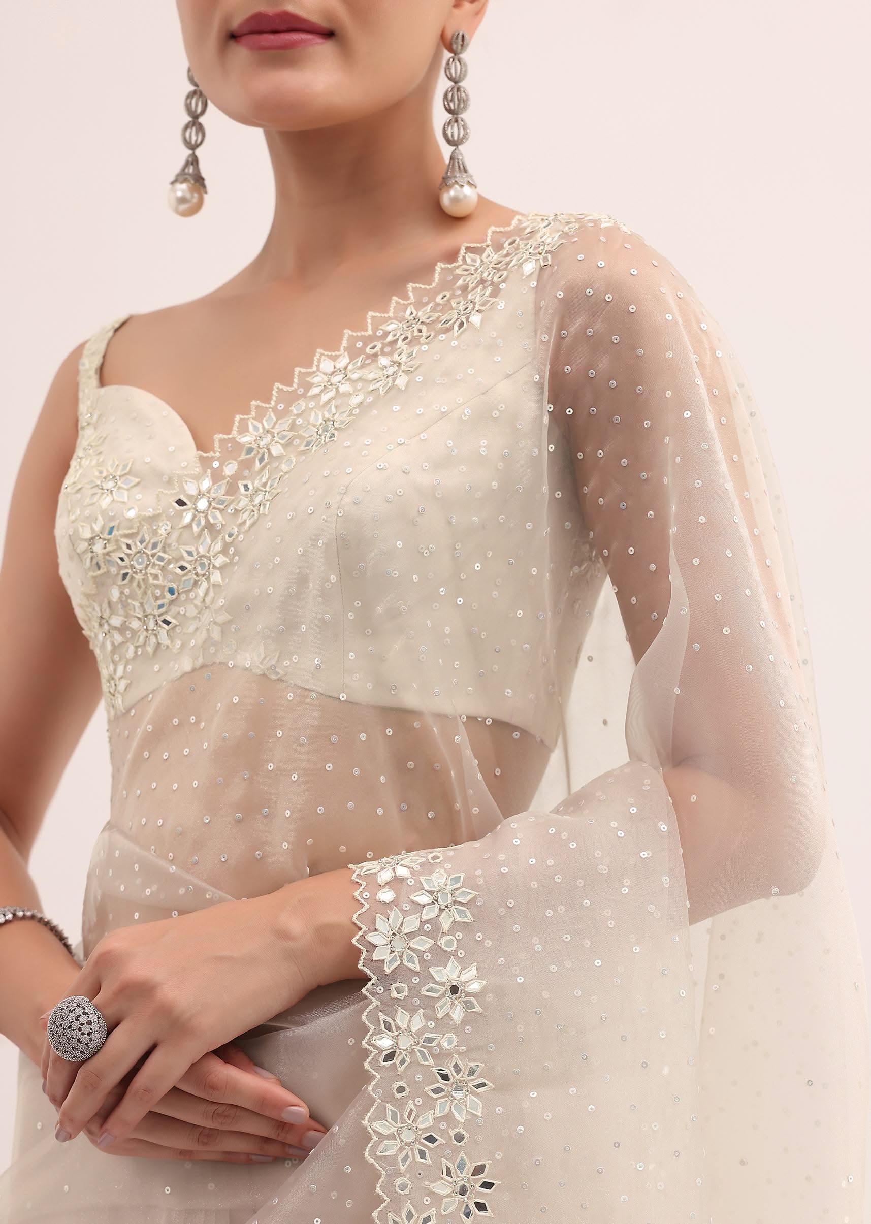off_white_organza_saree_in_sequins_with_unstitched_blouse-sg213860_5_7ca08c32-d45f-4856-b76c-72d2b5bb0000.jpg