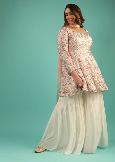 off_white_sharara_suit_in_georgette_with_peplum_kurti_adorned_in_colorful_resham_and_mirror_abla_jaal_online_-_kalki_fashion_-_sg61868_2_3f639bf5-3f4d-42f2-b019-4338c97782e5.jpg
