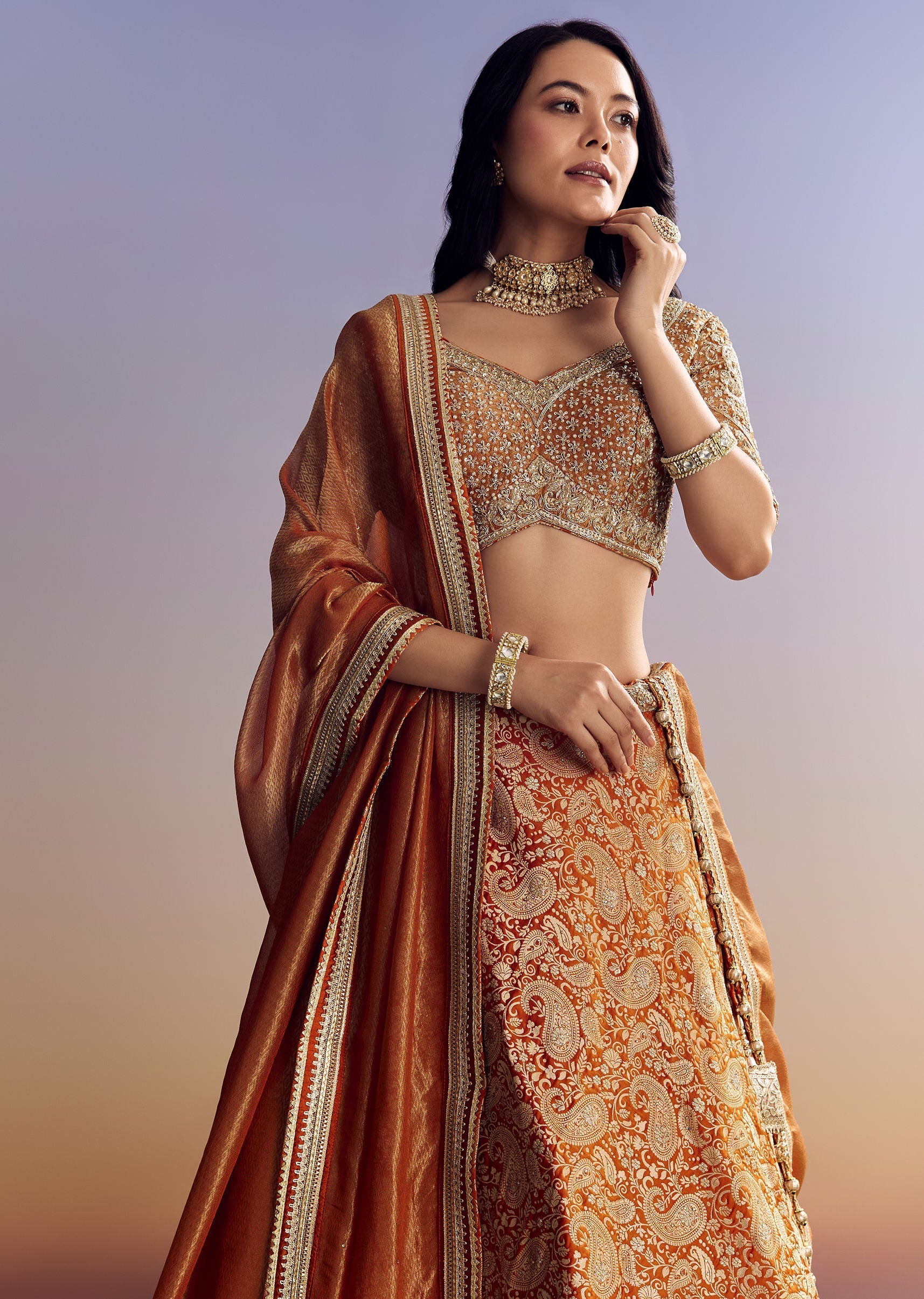 orange-banarasi-lehenga-with-embroidered-choli-and-dupatta-sg264599-1_7dc0dbc2-0110-4ba3-8977-540e0581e321.jpg