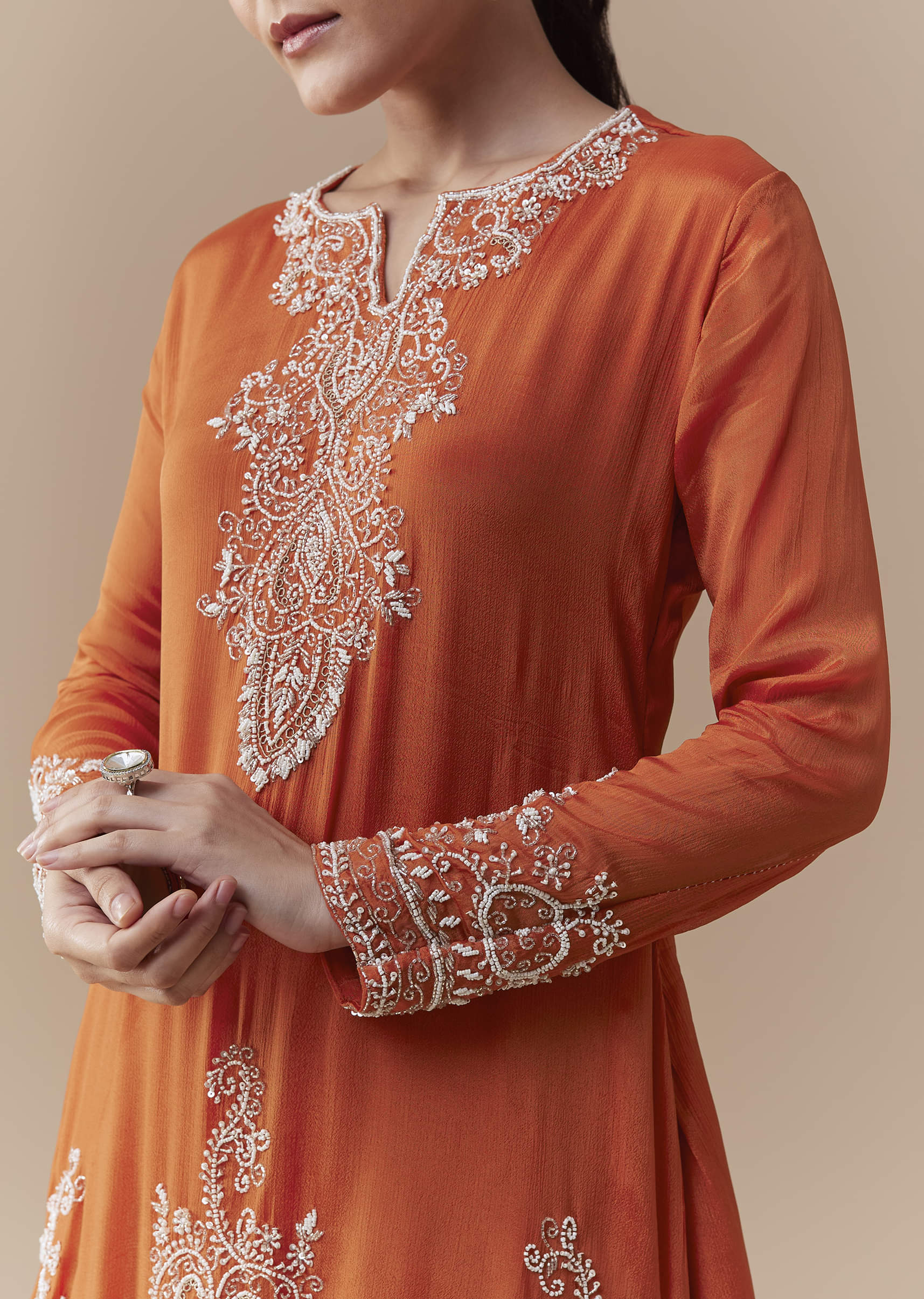 orange-chinon-kurta-skirt-set-with-moti-work-sg365144-2.jpg