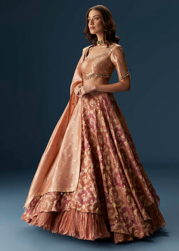 Orange Embroidered Blouse With Ruching Lehenga And Tassel Dupatta