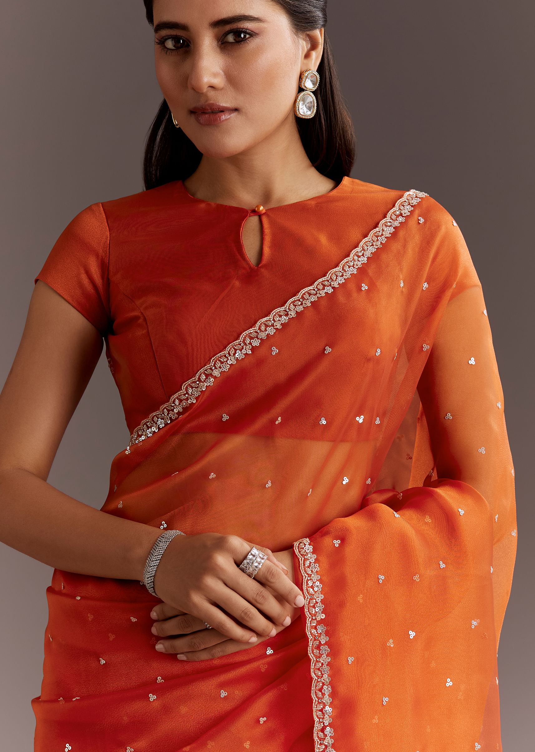 orange-glass-tissue-saree-with-cutdana-and-sequins-scallop-border-sg291260-3_866fff45-0f96-4252-b57f-d7a59daace17.jpg