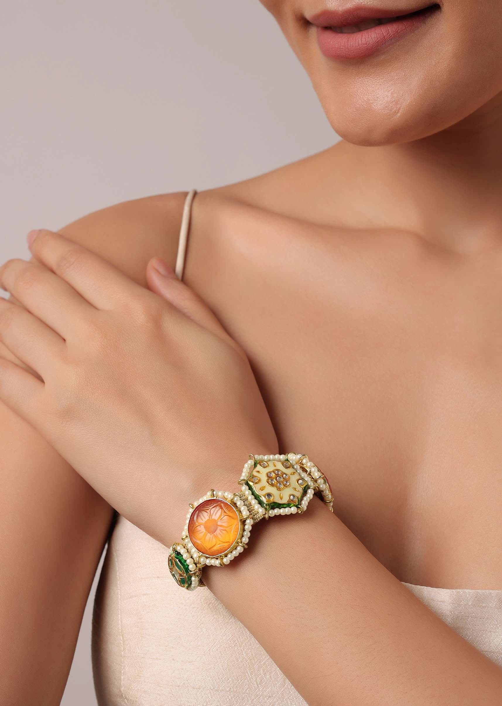 orange_bracelet_with_geometric_motifs-sg180730_3_8550a3af-33e6-4926-a3e3-83d21e17d2a7.jpg