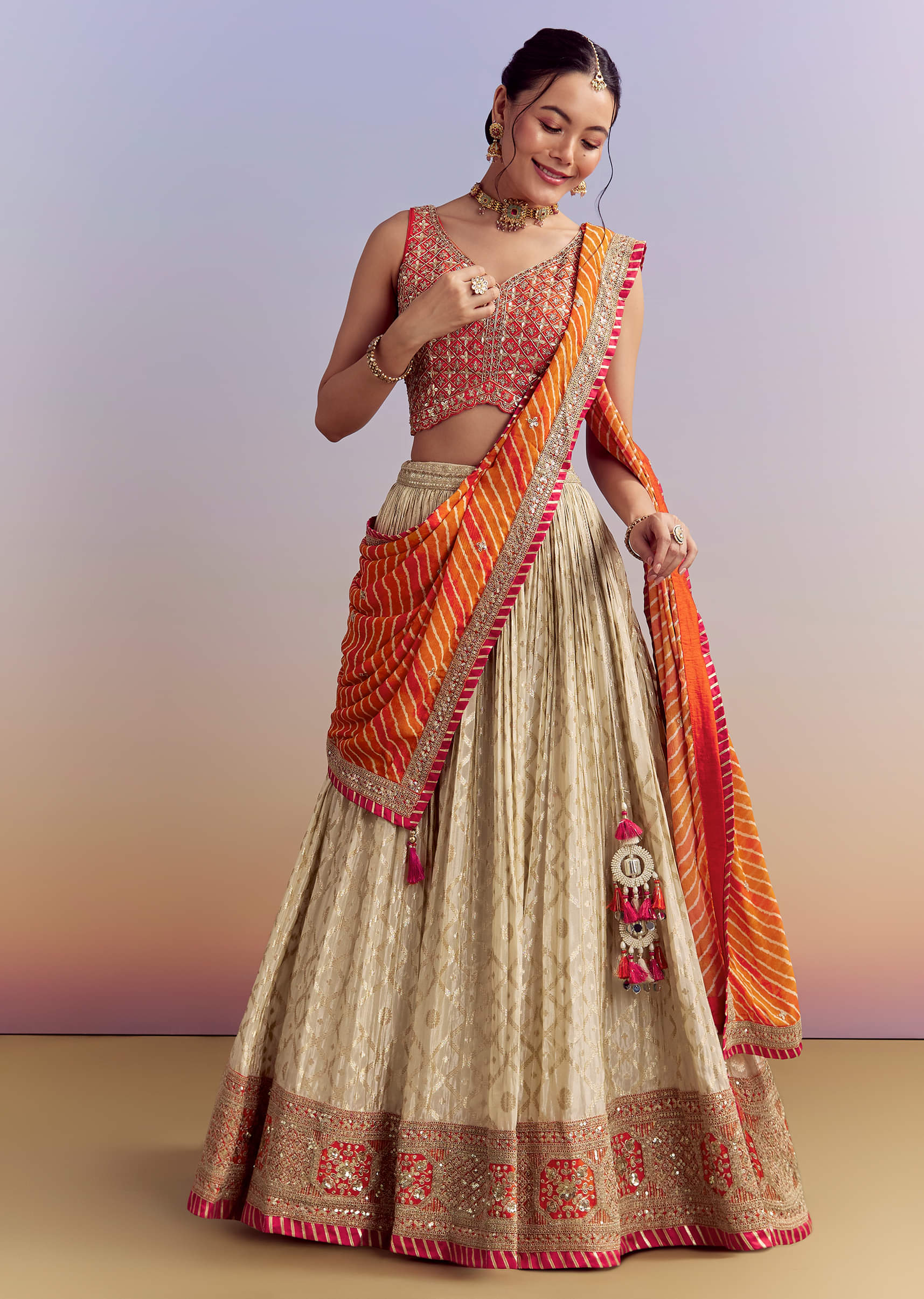 orange_brocade_silk_bridesmaid_lehenga_with_leheriya-sg308821-1-nosto_4.jpg