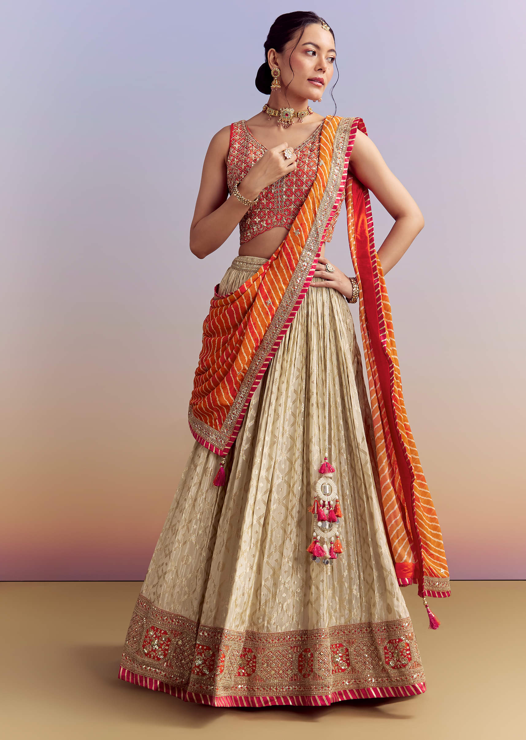 orange_brocade_silk_bridesmaid_lehenga_with_leheriya-sg308821-1-nosto_7.jpg