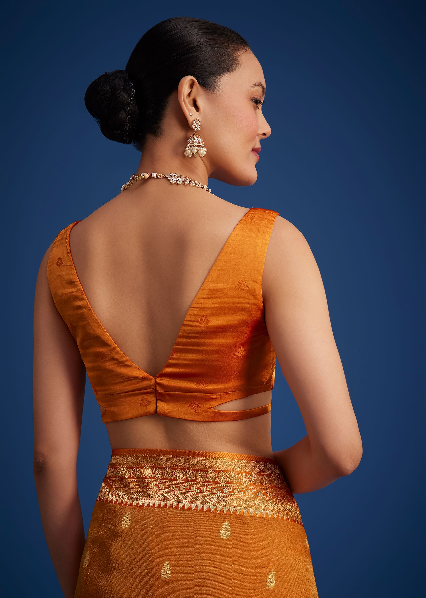 orange_tissue_silk_saree_with_zari_border-sg276492_9_58aa1557-057f-411e-92fe-18623d3e54ae.jpg