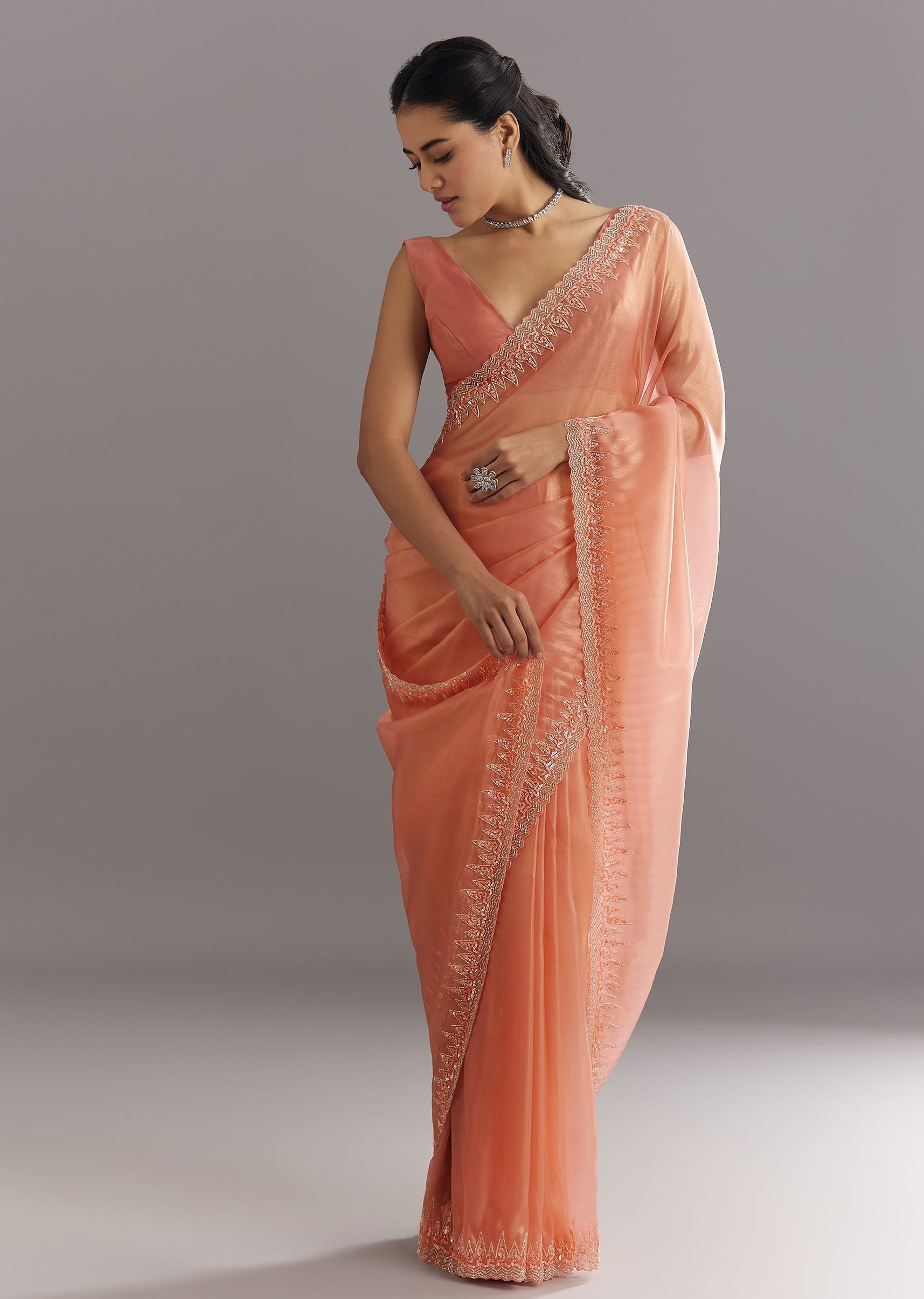 peach-glass-tissue-saree-with-cutdana-sequins-embroidery-and-cutwork-scallop-border-sg292882-3_1d236593-4998-4f97-9479-e6157f4ba851.jpg