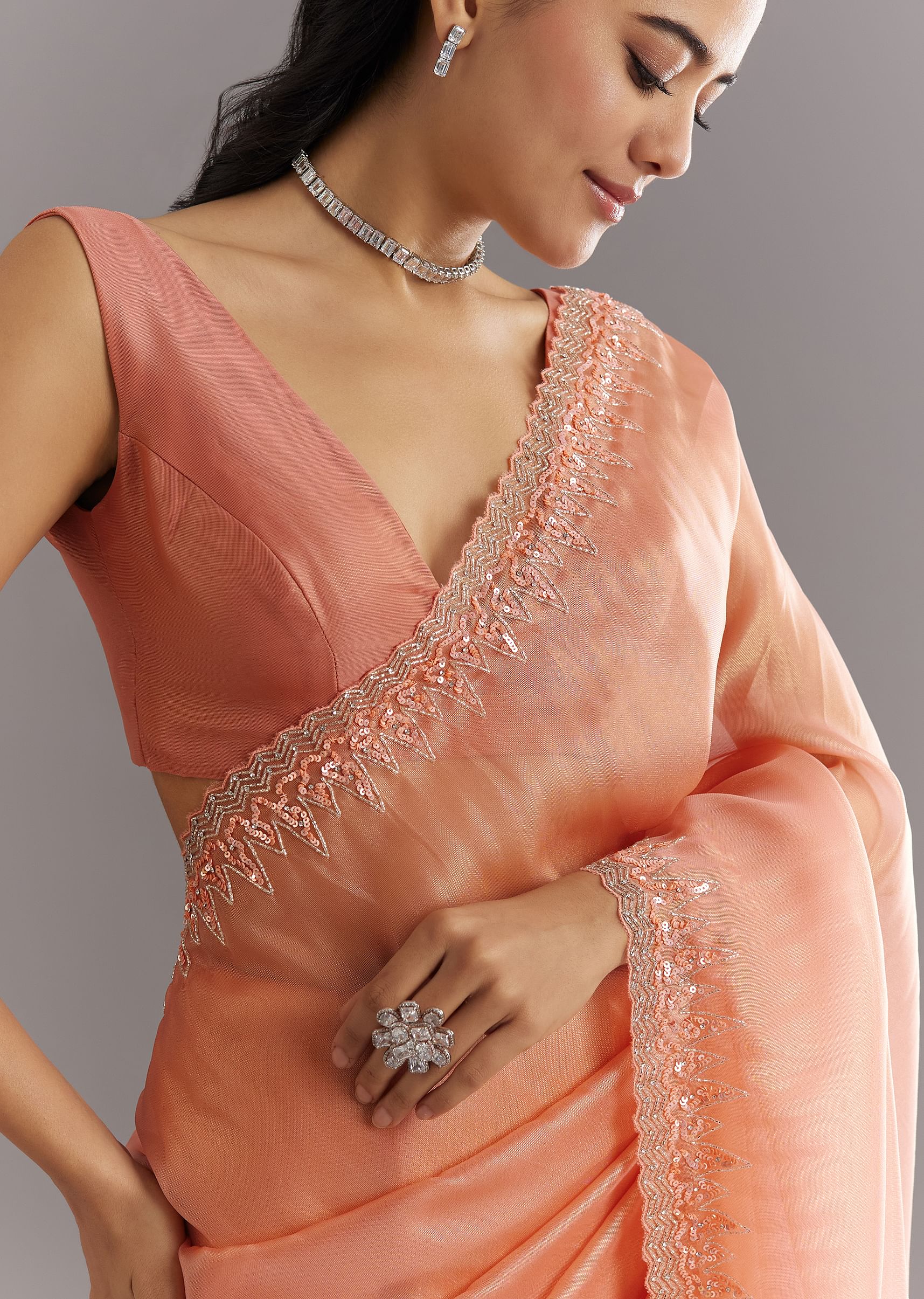 peach-glass-tissue-saree-with-cutdana-sequins-embroidery-and-cutwork-scallop-border-sg292882-5_d49ae48e-6fac-4059-ba1e-48f74505f210.jpg
