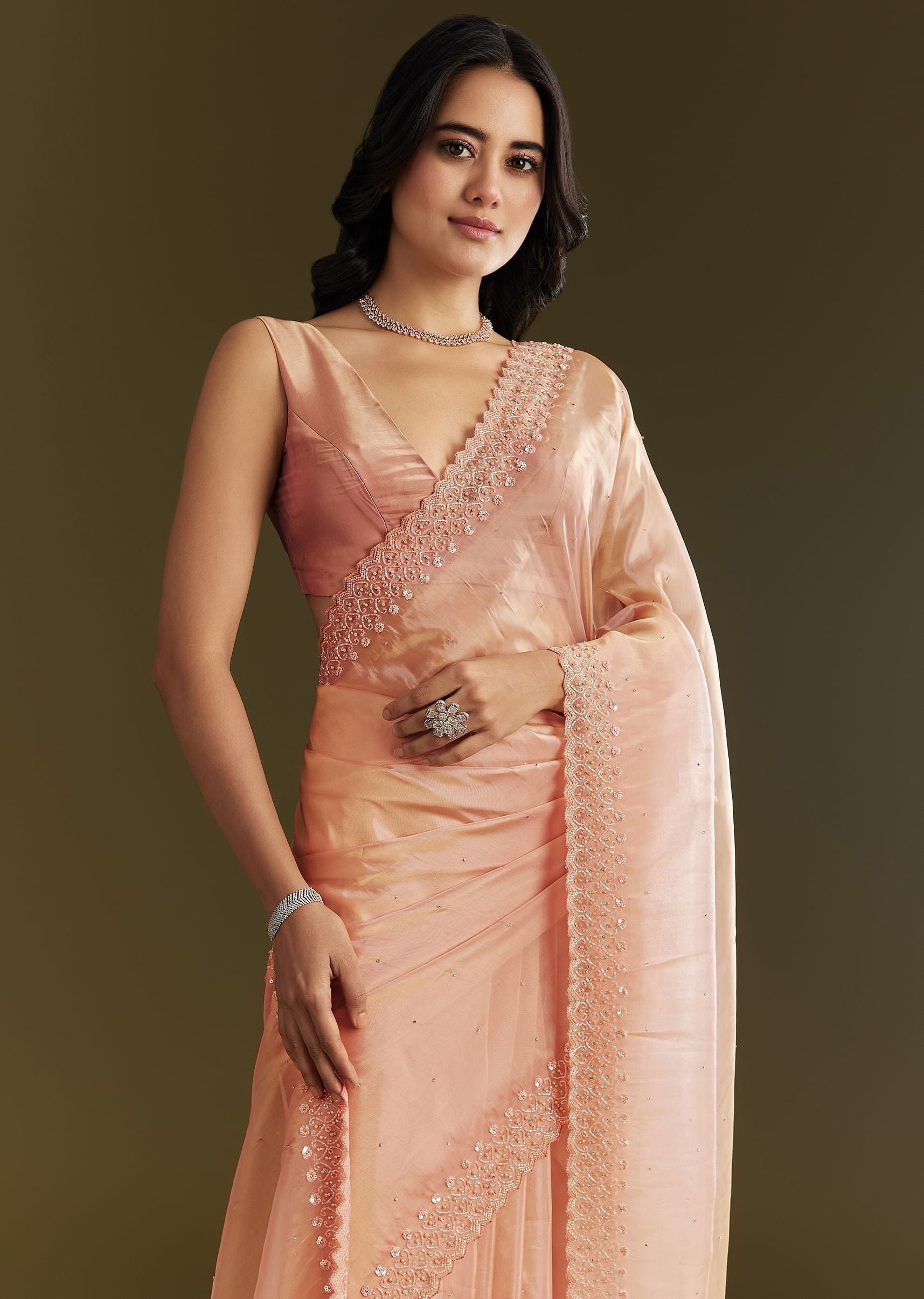 peach-organza-saree-with-stone-embellishment-and-scallop-border-sg293136-1_8ddcad48-3059-4dc7-8b68-c5421ac2a6f7.jpg