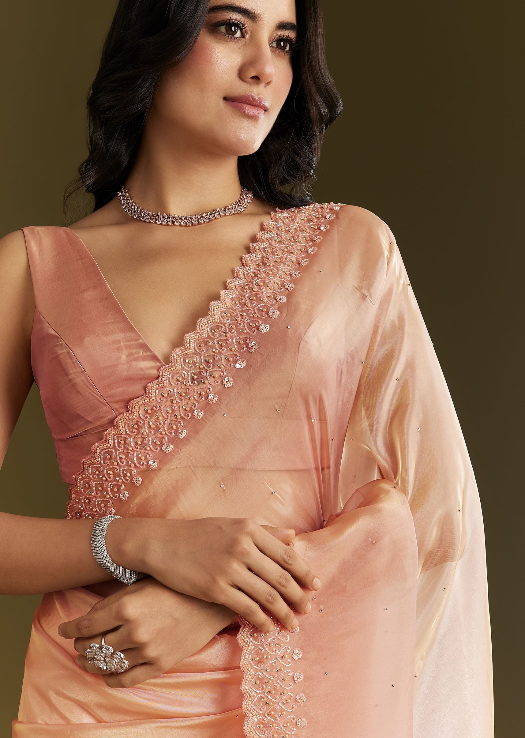 peach-organza-saree-with-stone-embellishment-and-scallop-border-sg293136-3_0aa42830-8e3c-44d5-94cb-cbce6ab7cc71.jpg