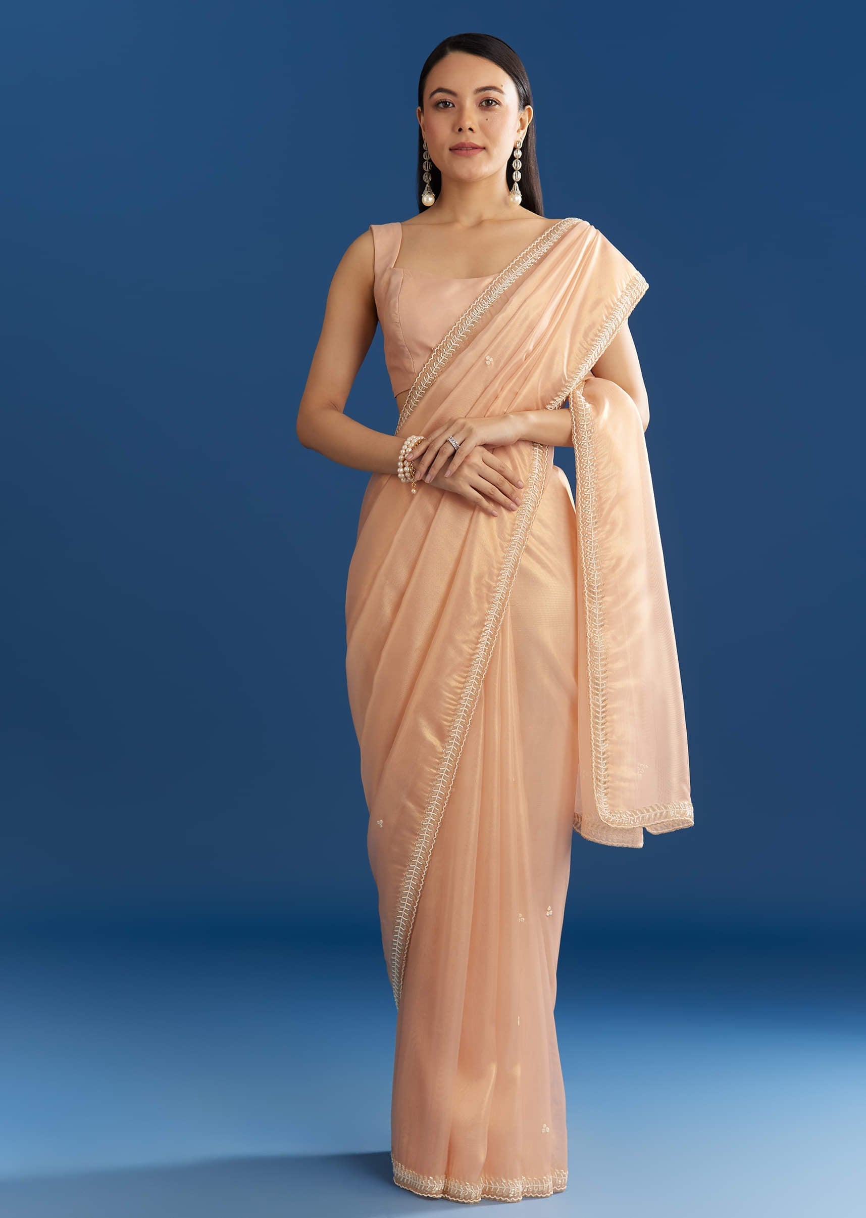peach-organza-tissue-saree-with-beaded-border-sg211643-1_a98ae15e-e2a8-41ed-9fe9-30a340fdac77.jpg