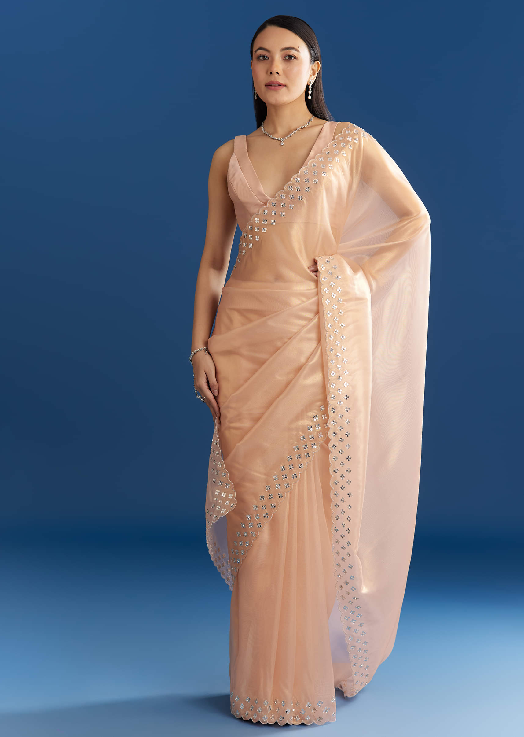 peach-organza-tissue-saree-with-cutdana-embellished-border-sg284843-1_a4966476-5e77-4d0f-ab97-0b88f2544851.jpg