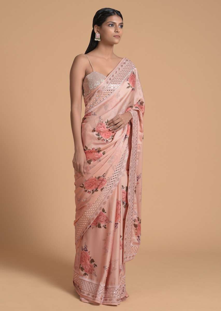 peach-saree-in-satin-crepe-with-floral-print-and-gotta-patti-embroidered-border-online-kalki-fashion-s0022940y-sg47018_2_71e2e99a-762f-4557-a020-e9f968967097.jpg