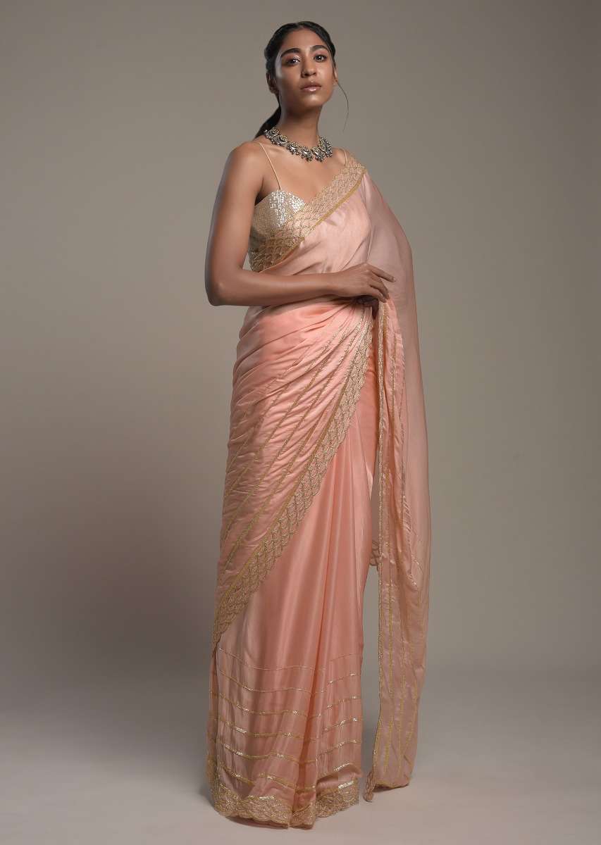 peach-saree-in-satin-with-cut-dana-and-zardosi-embroidered-stripes-and-unstitched-blouse-online-kalki-fashion-k002srhs1090y-sg53445_3_38bf380b-7497-400d-bdd9-60a50564b1c8.jpg