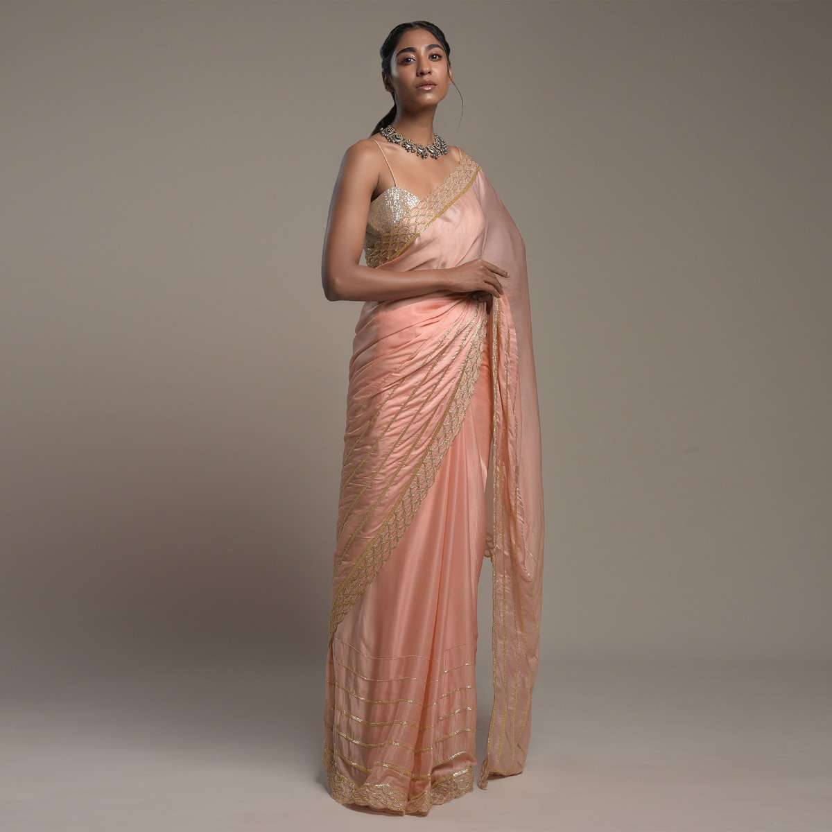 peach-saree-in-satin-with-cut-dana-and-zardosi-embroidered-stripes-and-unstitched-blouse-online-kalki-fashion-k002srhs1090y-sg53445_4_d2cc301c-cdd6-4fcd-a191-2b9248533343.jpg